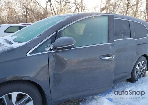 2014 Honda Odyssey Touring/Touring Elite z USA, uszkodzony, nr VIN 5FNRL5H9XEB005892